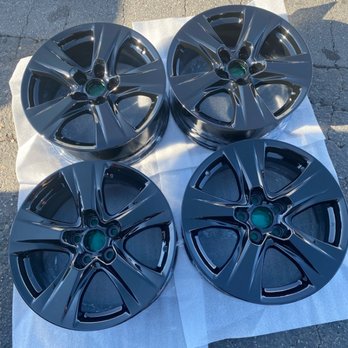 Set of four gloss black alloy wheels